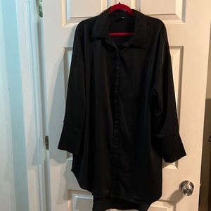 Sheer black shirt dress.